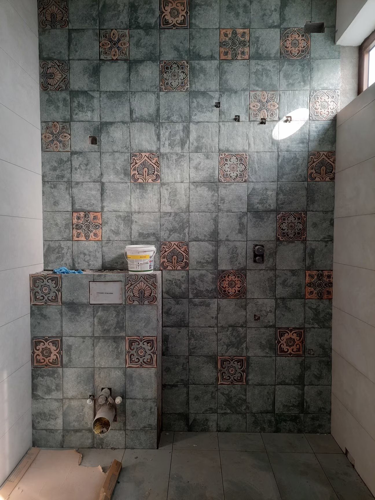 Marble-look wall and counter tile work